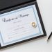 : Bride signing marriage certificate at wedding ceremony, illustrating how to correct marriage certificate errors